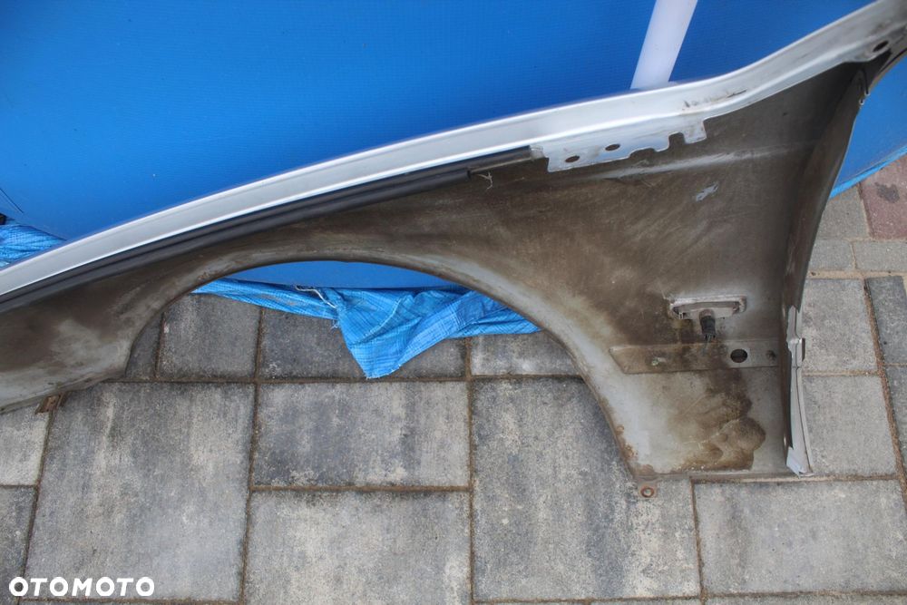 BŁOTNIK PRAWY PRZÓD TITANSILBER BMW E39 - 7
