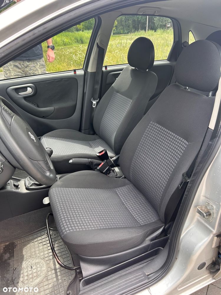 Opel Corsa 1.2 16V Cosmo - 13
