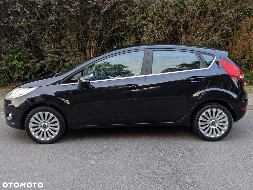 Ford Fiesta 1.4 Ghia EU5 - 7