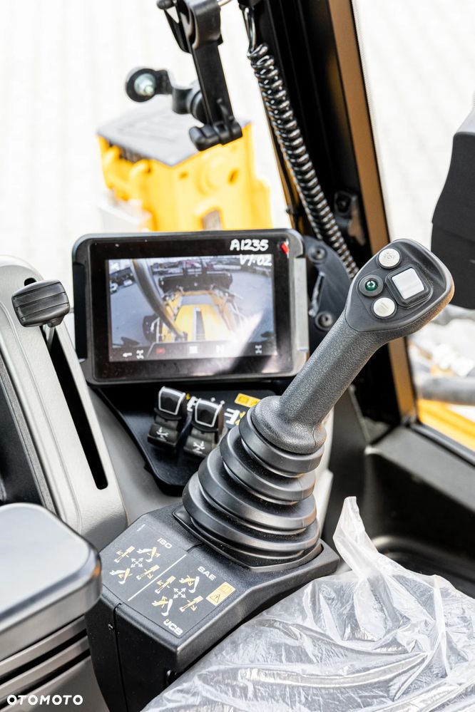 JCB 4CX PRO POWERSLIDE EH Dual Drive | Nowa | bez przebiegu | 110KM - 35