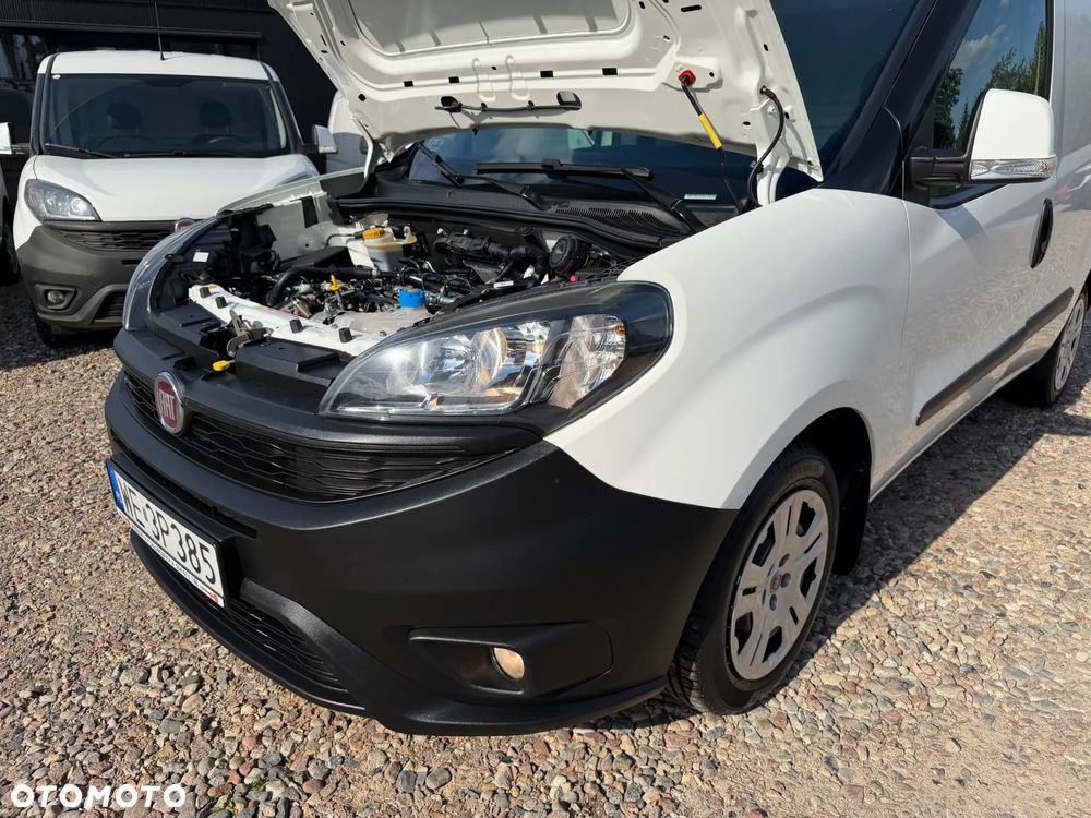 Fiat DOBLO VAN VAT-1 Homologacja cięż. DMC: 2145kg Ładowność 706kg MOCNY SILNIK 1.6 MultiJet, 105KM Emisja Euro-6, Skrzynia biegów 6-cio stopniowa! ORYGINALNA ZABUDOWA PAKI, BOCZNE DRZWI PRZESUWNE, RADIO FABRYCZNE, Hak 1300kg, PODGRZEWANE FOTELE Z REG. I PODŁOKIETNIKIEM, BAGAŻNIK DACHOWY ORYGINALNY FIAT, PARKTRONIKI, ALARM.. - 36