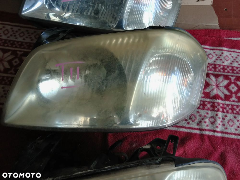 MAZDA TRIBUTE LAMPA LEWA PRZEDNIA PRZED LIFTING CZESCI ROZNE - 6