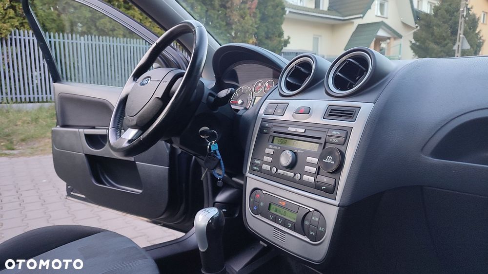 Ford Fiesta 1.4 Ghia - 18