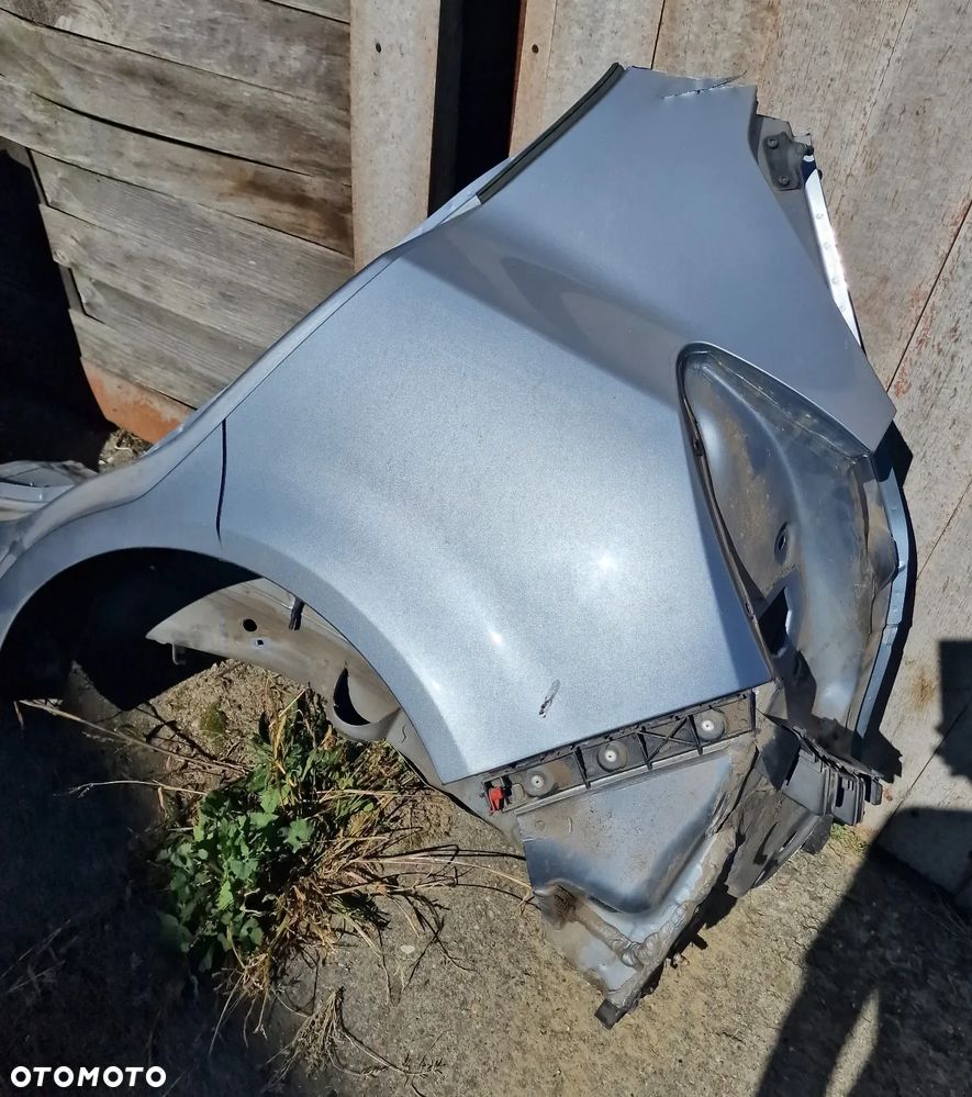 BŁOTNIK TYŁ+ PRÓG LEWY OPEL CORSA D 5D - 7