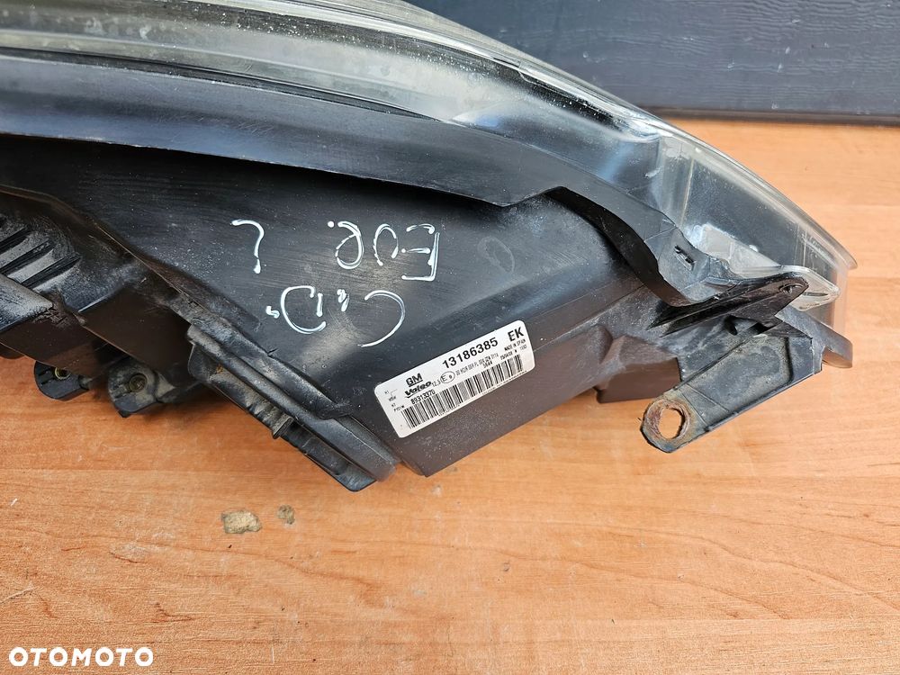 LAMPA SOCZEWKA LEWY PRZÓD LEWA PRZEDNIA OPEL CORSA D EUROPA 13186385 - 8