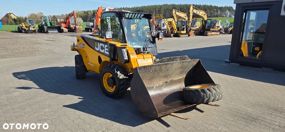 JCB <<JCB 520-40, 2010 rok, łyżka+widły,przedłużki do wideł, zapasowe koło, sprowadzona!>> - 4