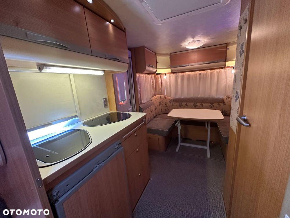 Adria ADORA 472 LU z napędem i markizą ze ścianami.  DMC 1300 - 38