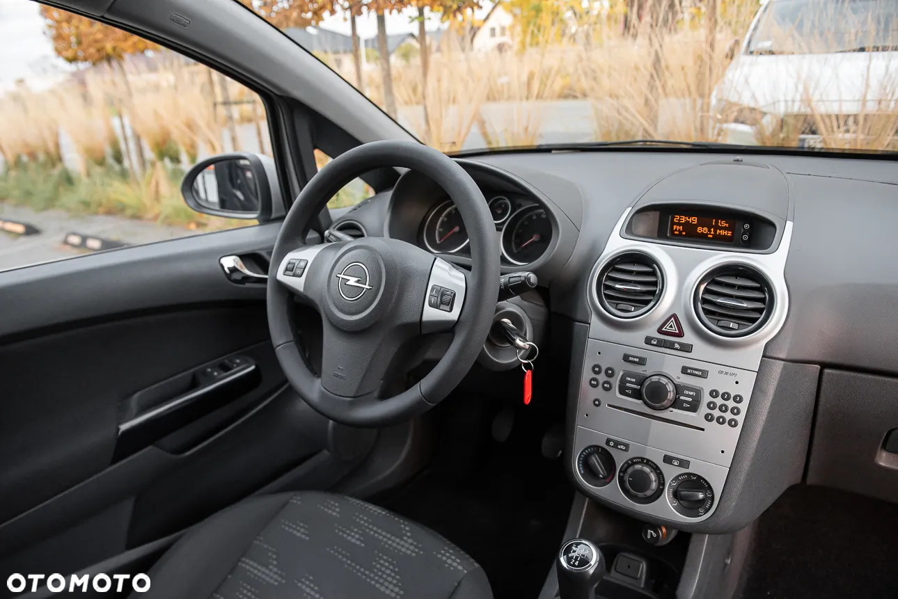 Opel Corsa 1.2 16V Enjoy - 23