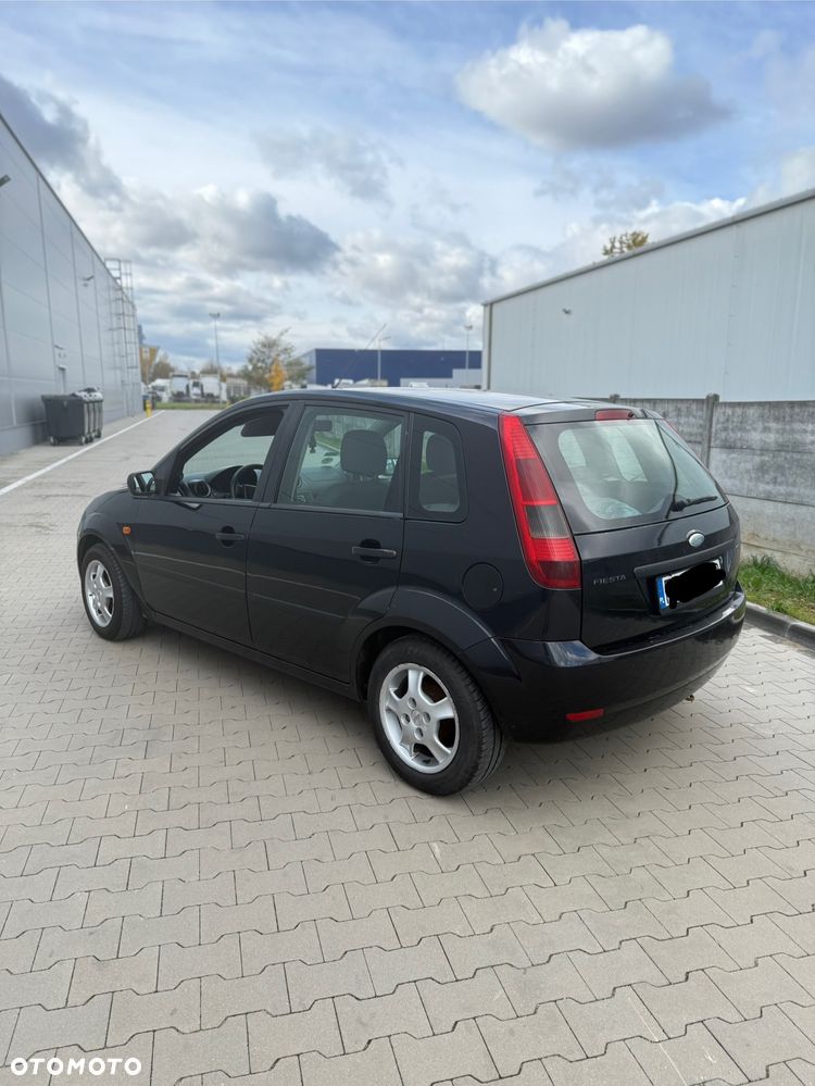 Ford Fiesta 1.4 Ghia - 7