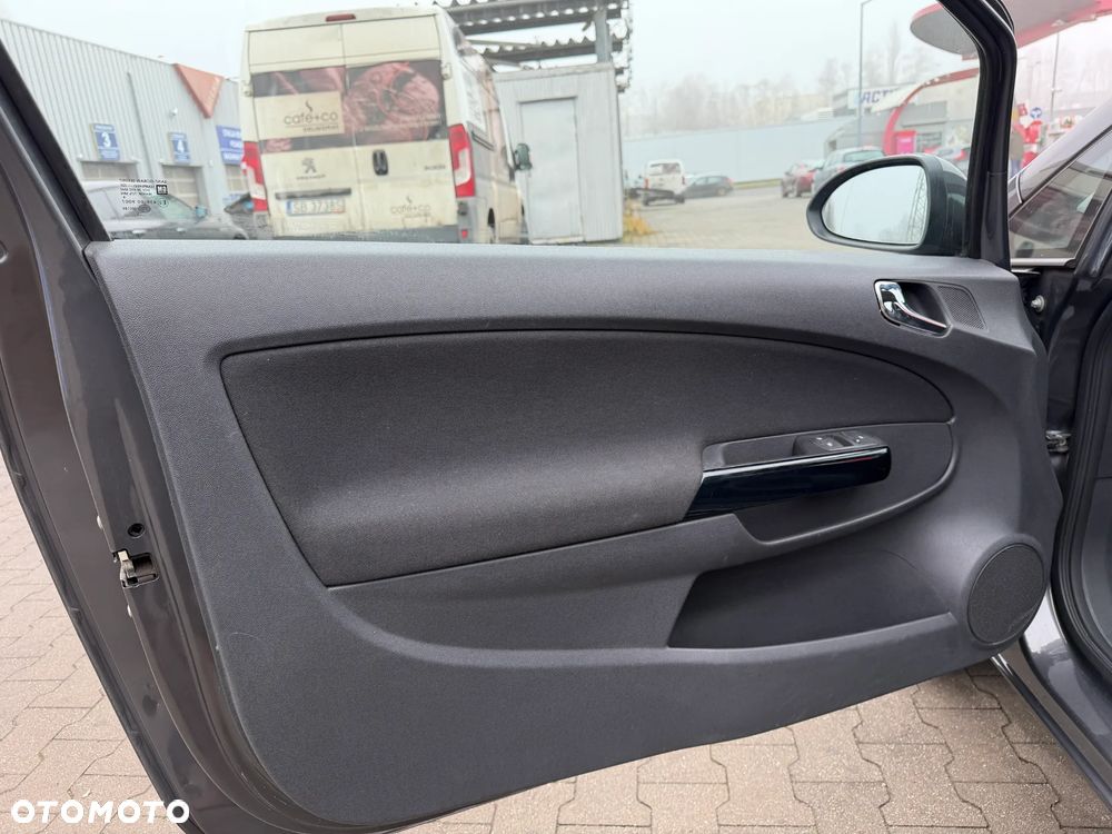 Opel Corsa 1.4 16V Cosmo - 31