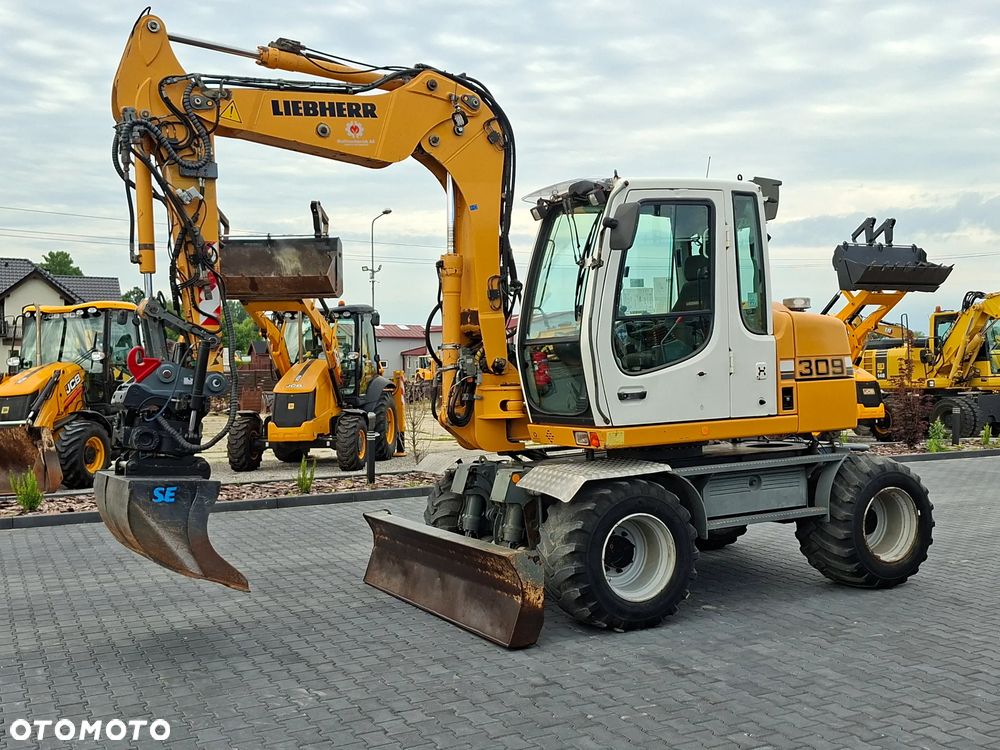 Liebherr A309 ROTOTILT - 1