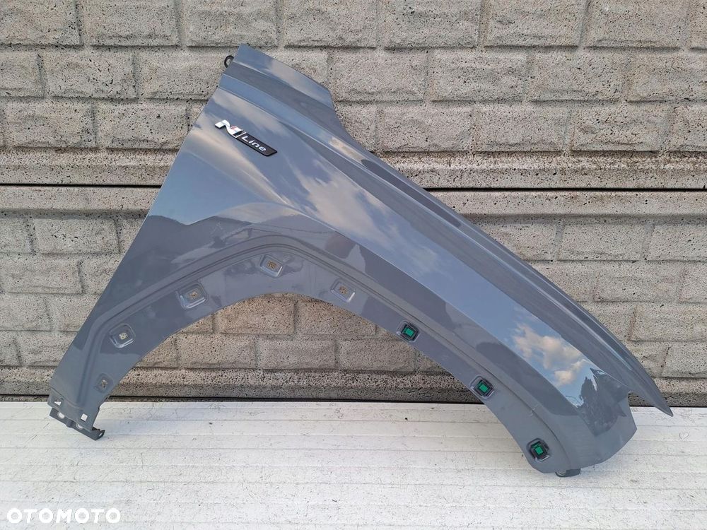 HYUNDAI TUCSON 2021-24 BŁOTNIK PRZEDNI PRAWY - 1