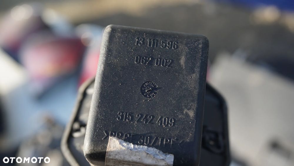 REFLEKTOR LAMPA ZBIORNIK PŁYNU SCHOWEK PASAŻERA ASTRA H - 14