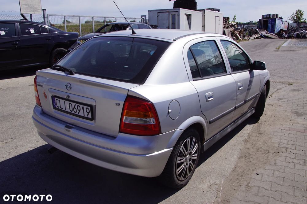Auto na części - Opel Astra II G 1.6 16V 101 KM Z16XE F17 Z157 2002R Silnik Skrzynia Drzwi Maska Błotnik Zderzak Klapa Lampa Lusterko Klamka Szyba Deska Kokpit Sterownik Moduł Czujnik Licznik Panel Kierownica - 6