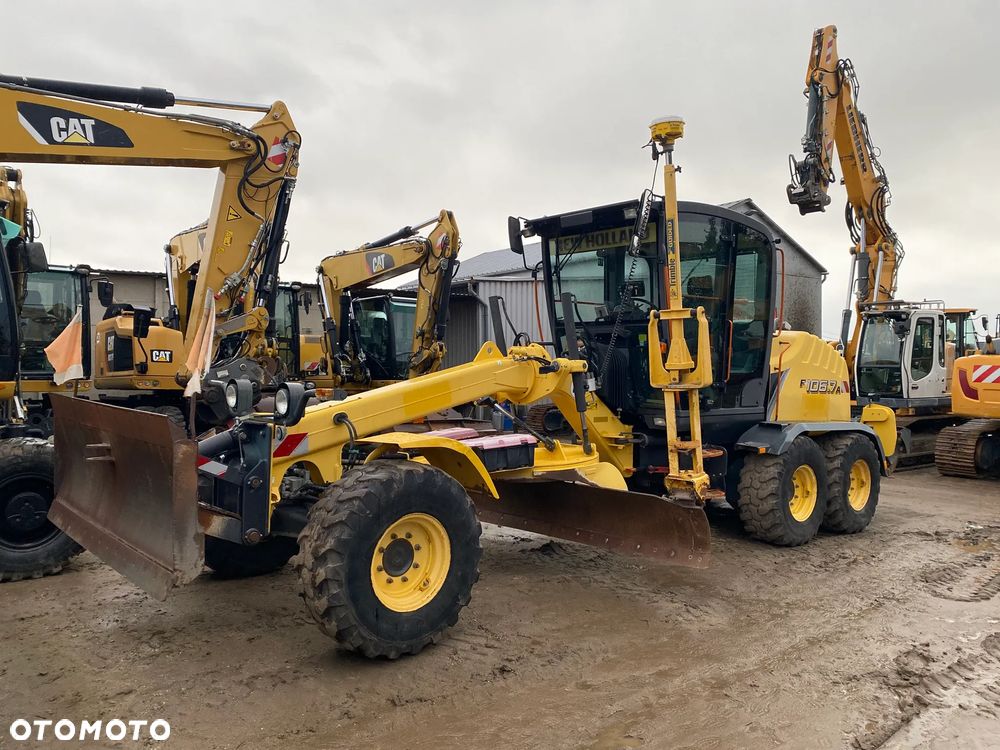 New Holland F106.7A, 7800 MTH, SYSTEM NIWELACJI TRIMBLE 3D, Z NIEMIEC, NAPĘD 6X6, ZRYWAK, PRZEDNI PŁUG, - 2