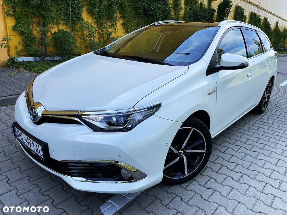 Toyota Auris 1.8 HSD Prestige NAVI - 1