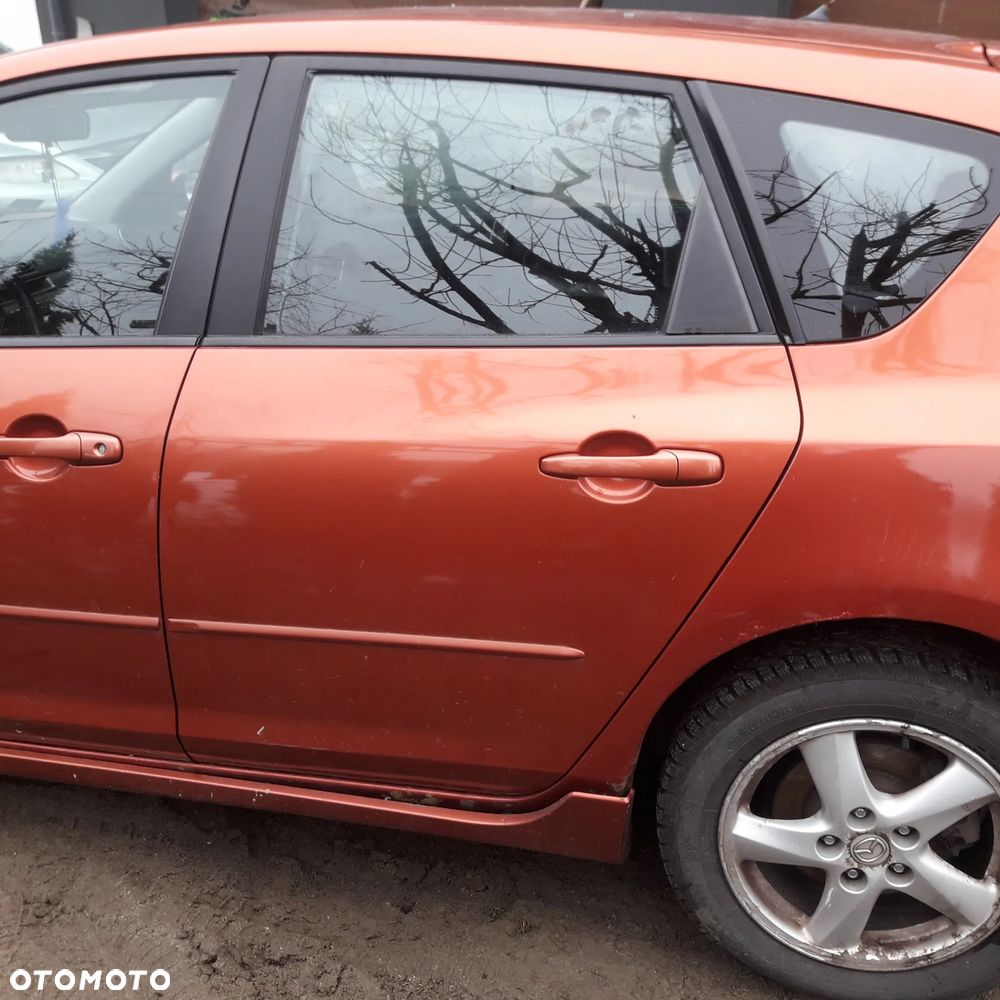 Mazd 3 BK 03-09 Drzwi tylne lewe z szyba  tył w kolor - 2