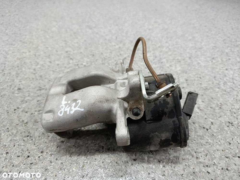 ZACISK HAMULCOWY LEWY TYŁ VW PASSAT B6 2.0 TDI - 2