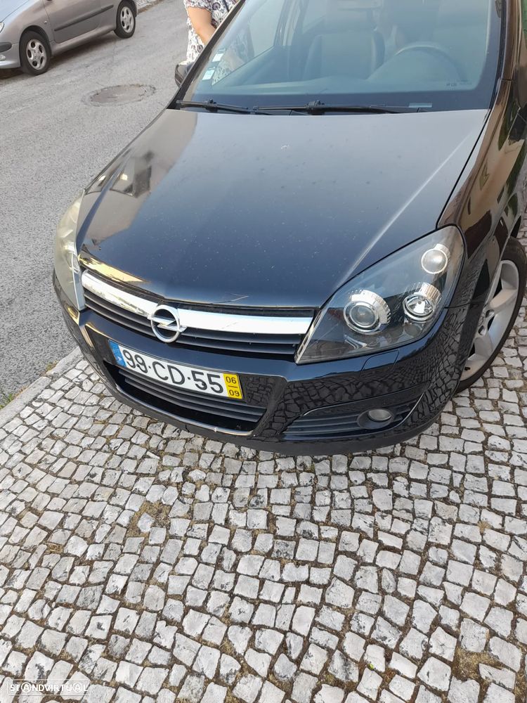 Opel Astra Caravan 1.9 CDTI Cosmo - 7