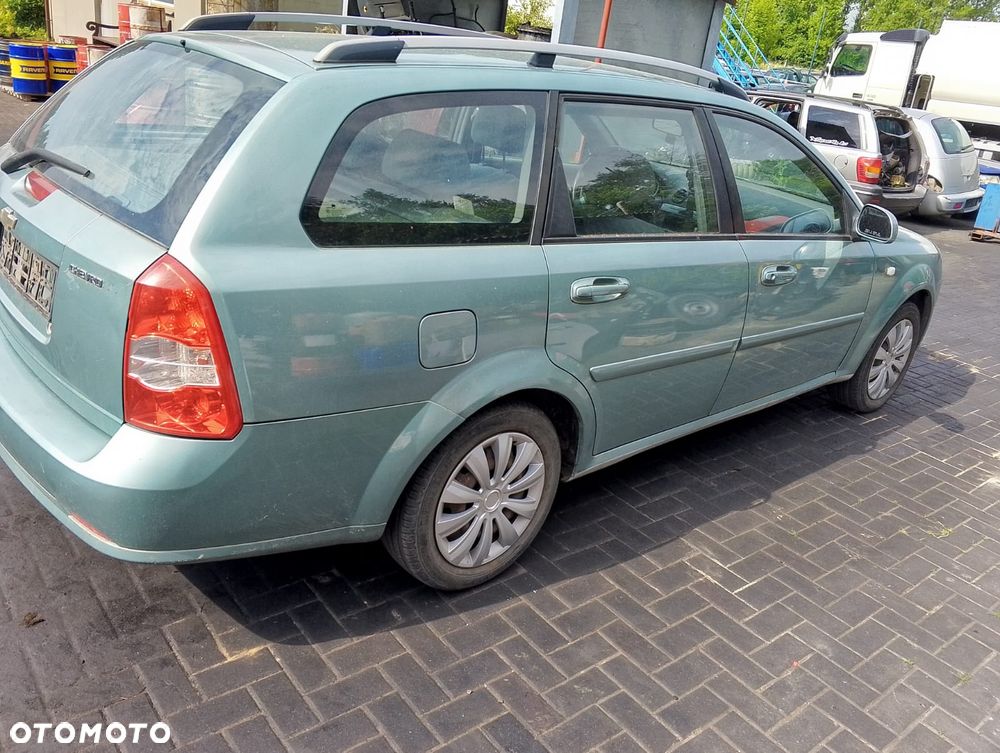 Chevrolet Lacetti I (03-09r.) 1.6 B 108KM. Silnik F16D3 Skrzynia EMG.Cały na części.GWARANCJA !!! Przód Tył Zestaw Komplet Drzwi Klapa Zderzak Błotnik Maska Grill Atrapa Szyba Pas Lampa Lusterko Boczki Fotel Kanapa Kokpit Deska Rozdzielcza Przełącznik Włącznik Sterownik Przewody Wiązka Instalacja Moduł Komputer Czujnik Listwa Pompa Alternator Wtryski Głowica Rozrusznik Kompresor Sprzęgło Dwumas Silnik Skrzynia ABS Klimatyzacji Paliwa Wspomagania Kolektor Turbina Przepustnica Zawór Chłodnica Koło Hak Belka Sanki Zawieszenie Mcpherson Półoś Amortyzator Wydech Tłumik Zacisk Most - 6
