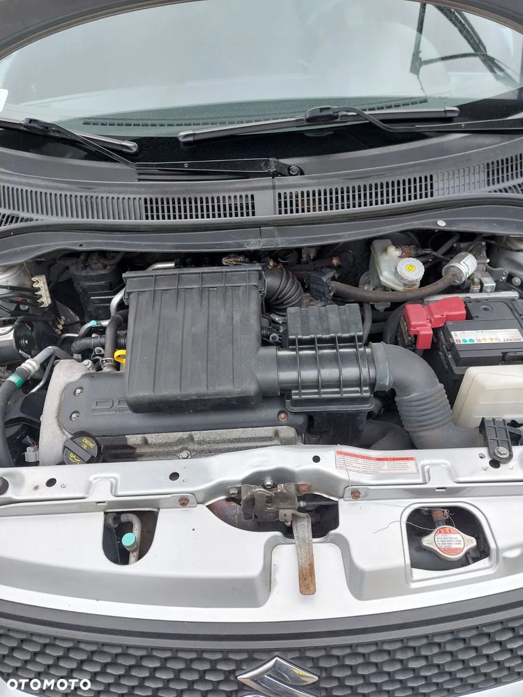 Suzuki Swift 1.3 GLX / Comfort - 11