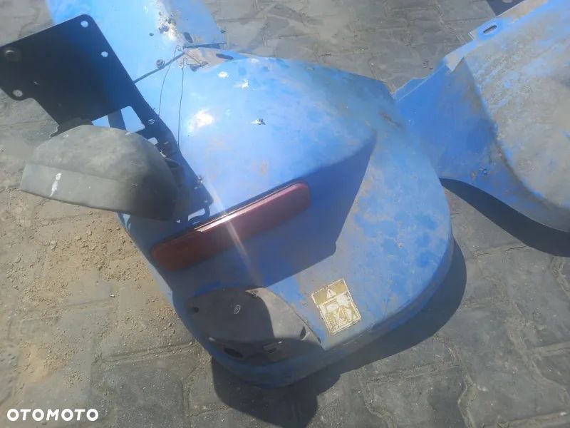 Błotnik tylny lewy końcówka New Holland TM190 - 1