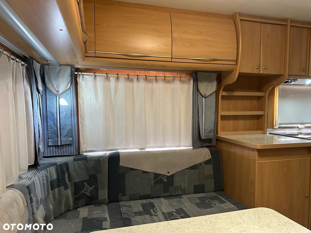 Burstner 720 TK VENTANA z napędem i łóżkami piętrowymi - 8 os. - 13