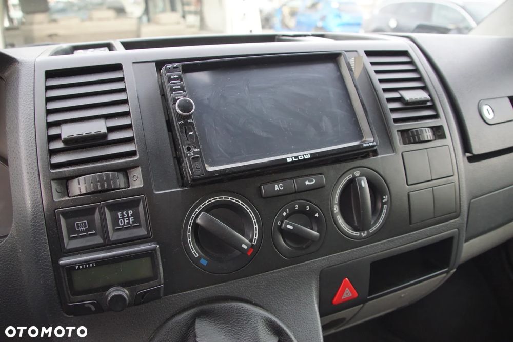Auto na części - Volkswagen Transporter T5 2.5 TDI 130 KM BNZ KPE LL5M 2008R Silnik Skrzynia Drzwi Maska Klapa Błotnik Zderzak Lampa Szyba Klamka Lusterko Deska Kokpit Sterownik Moduł Czujnik Licznik Wyświetlacz Panel Kierownica - 12
