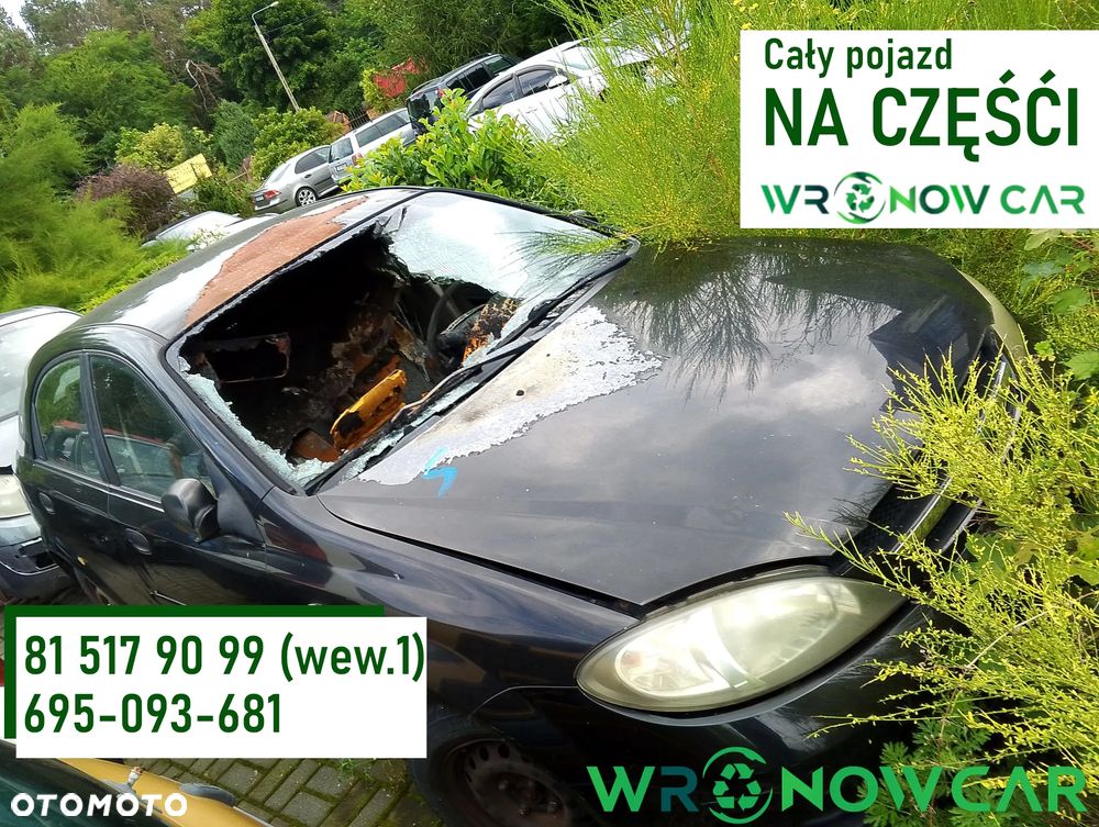 Chevrolet Lacetti I  (03-09r.) 1.4B 95KM. Silnik F14D3 Skrzynia MG5 lakier. Cały na części GWARANCJA !!!!  Przód Tył Zestaw Komplet Drzwi Klapa Zderzak Błotnik Maska Grill Atrapa Szyba Pas Lampa Lusterko Boczki Fotel Kanapa Kokpit Deska Rozdzielcza Przełącznik Włącznik Sterownik Przewody Wiązka Instalacja Moduł Komputer Czujnik Listwa Pompa Alternator Wtryski Głowica Rozrusznik Kompresor Sprzęgło Dwumas Silnik Skrzynia ABS Klimatyzacji Paliwa Wspomagania Kolektor Turbina Przepustnica Zawór Chłodnica Koło Hak Belka Sanki Zawieszenie Mcpherson Półoś Amortyzator Wydech Tłumik Zacisk Most - 1