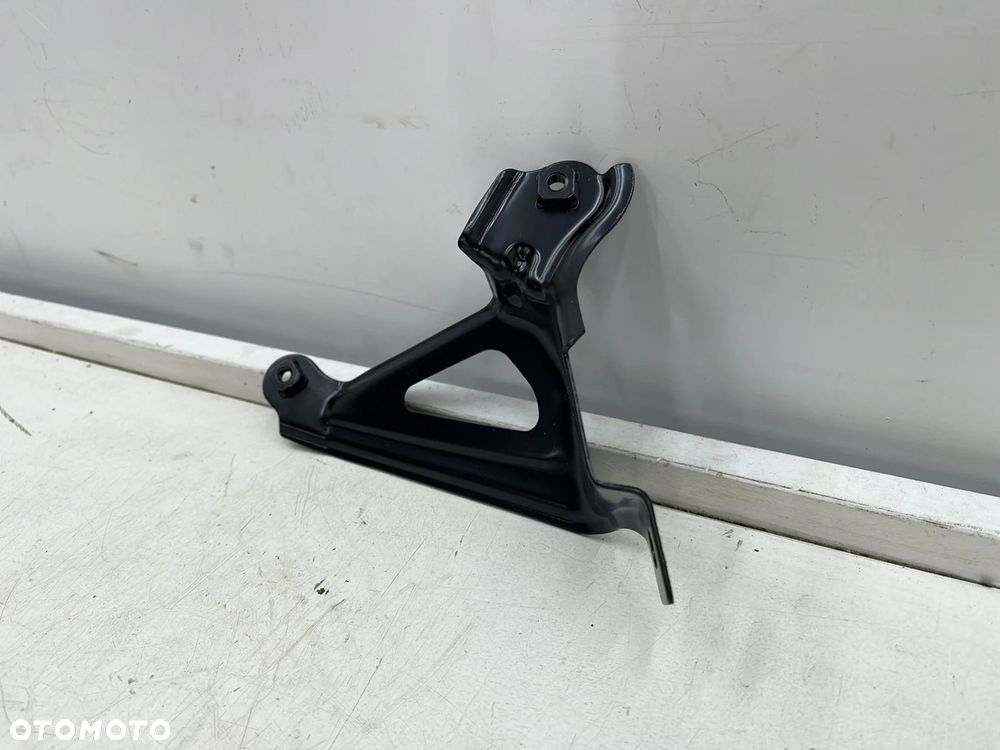 Mocowanie błotnika Toyota Corolla E21 18r.- lewe przednie wspornik podpora 53836-02040 - 4