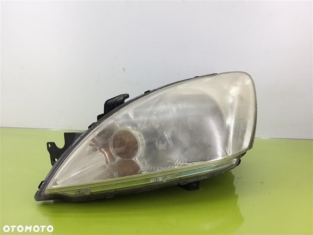 Reflektor lampa przód lewa Mitsubishi Lancer VII 2003-2011 - 1