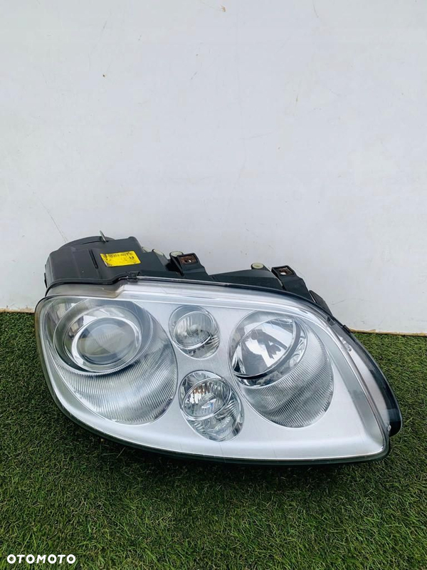 LAMPA PRAWA REFLKTOR PRAWY VW CADDY TOURAN XENON KSENON IDEALNA DEMONTAŻ