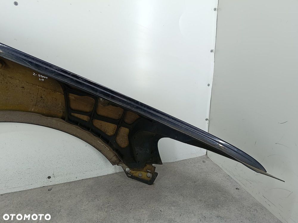 BŁOTNIK LEWY PRZÓD VW TOUAREG I LC9Z - 10