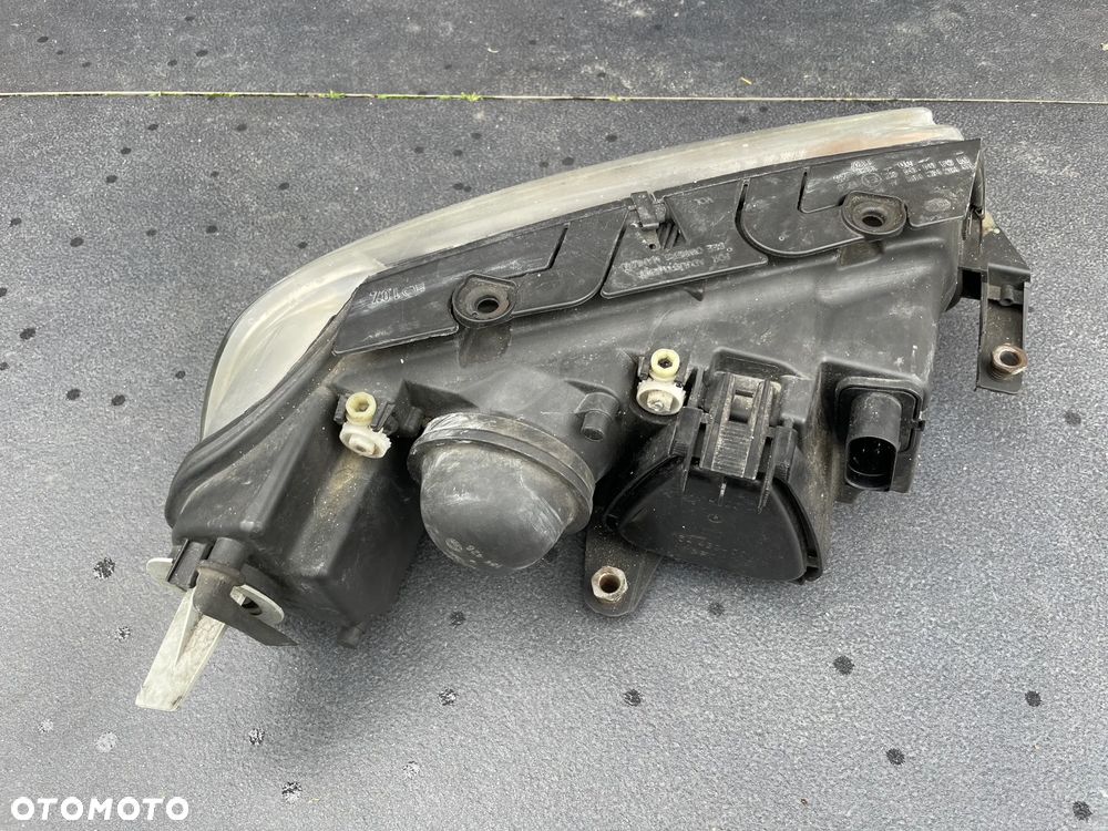 VW Passat B5 LIFT Reflektor Lampa lewy lewa PRZÓD HELLA - 3