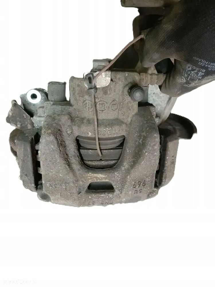 ALFA ROMEO GIULIETTA II 10-16 1,4 TB ZACISK hamulcowy lewy przód * - 1