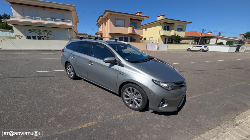 Toyota Auris Touring Sports 1.8 HSD Exclusive+Navi - 11