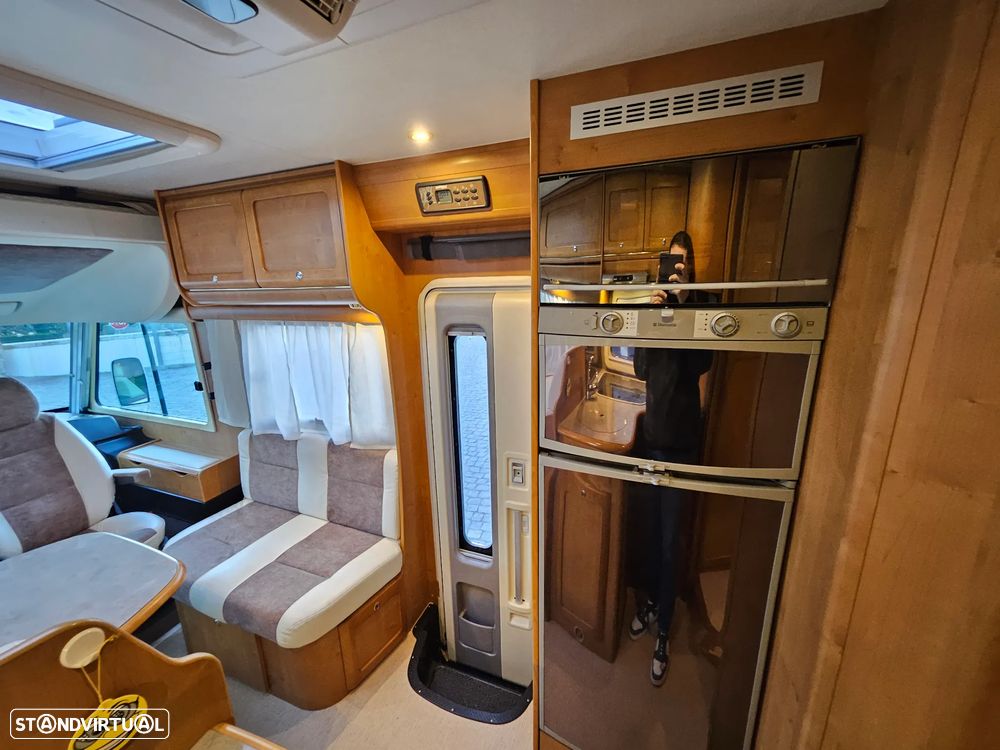 Rapido Le Randonneur 9097F CHASSI AL-KO Cama transversal + BASCULANTE - 26