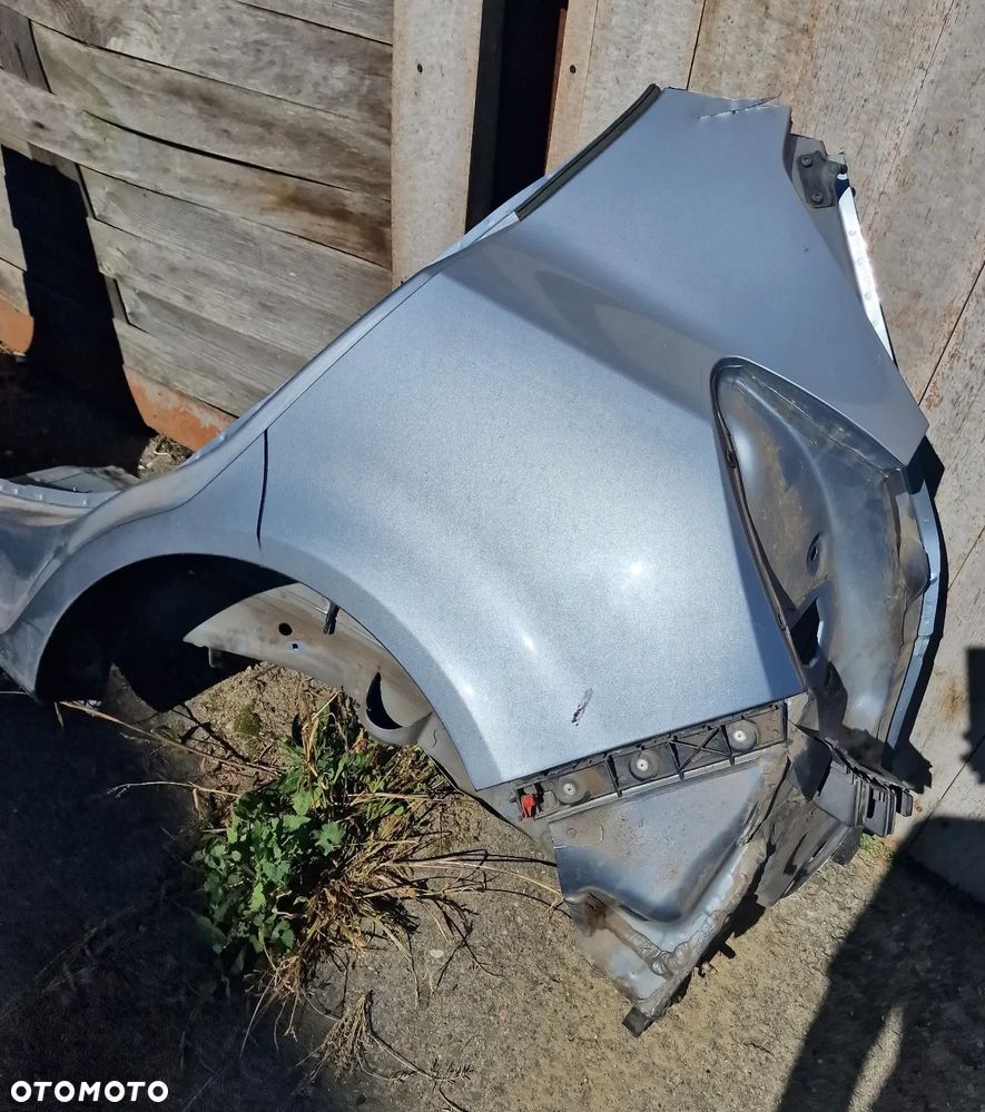 BŁOTNIK TYŁ+ PRÓG LEWY OPEL CORSA D 5D - 6