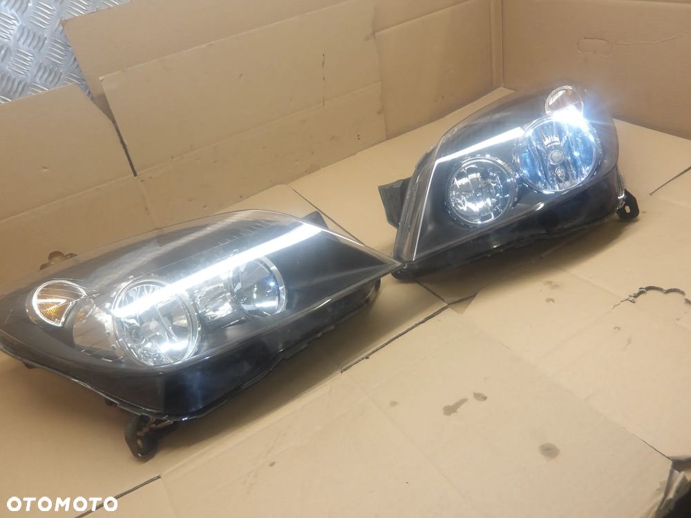 OPEL ASTRA H GTC 1.3D LAMPA PRAWA LEWA PRZÓD PRZEDNIA 24451033 24451034 - 14