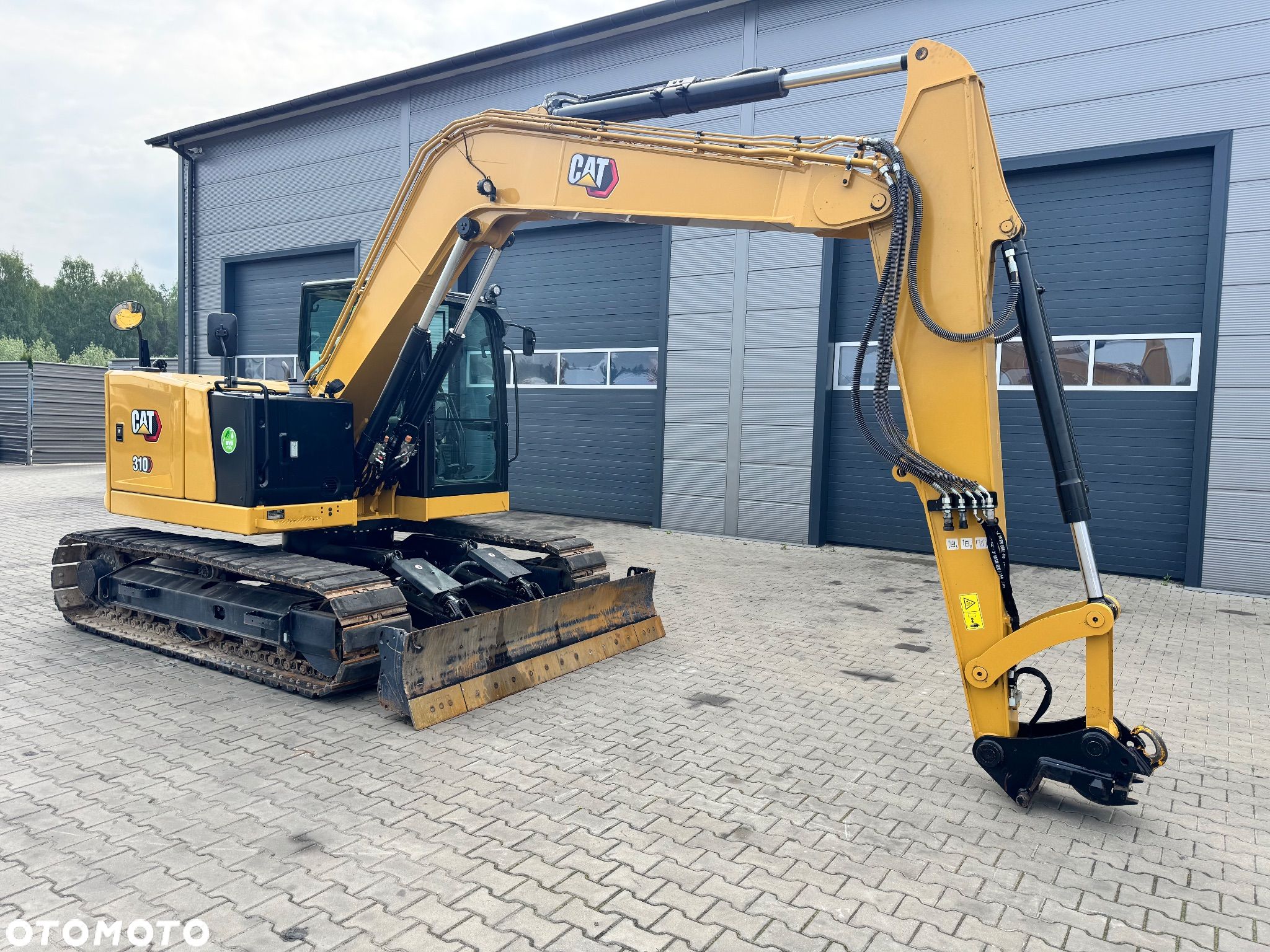 Caterpillar 310 - 1