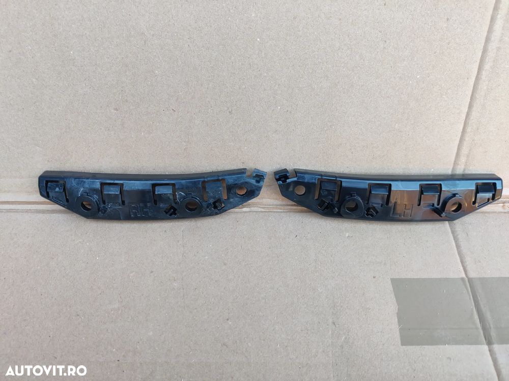 Suport plastic montare prindere bara fata pe aripa stanga dreapta NOI TESLA Model 3 1084182-00-E / 1084181 - 2
