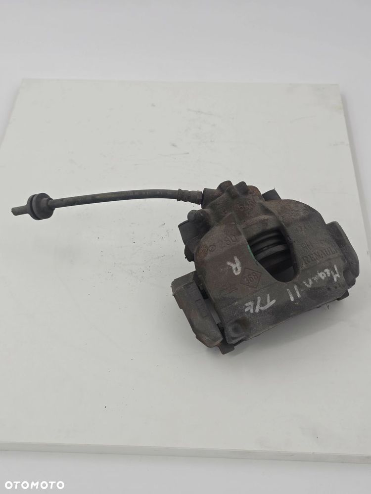 ORYGINALNY ZACISK HAMULCOWY PRAWY TYŁ RENAULT MEGANE II 7701207694