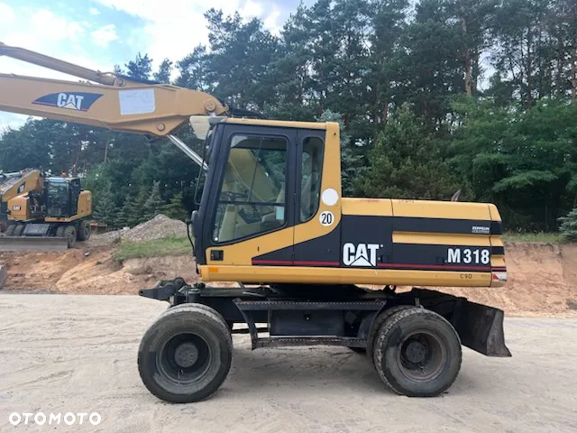 Caterpillar M318 - 6