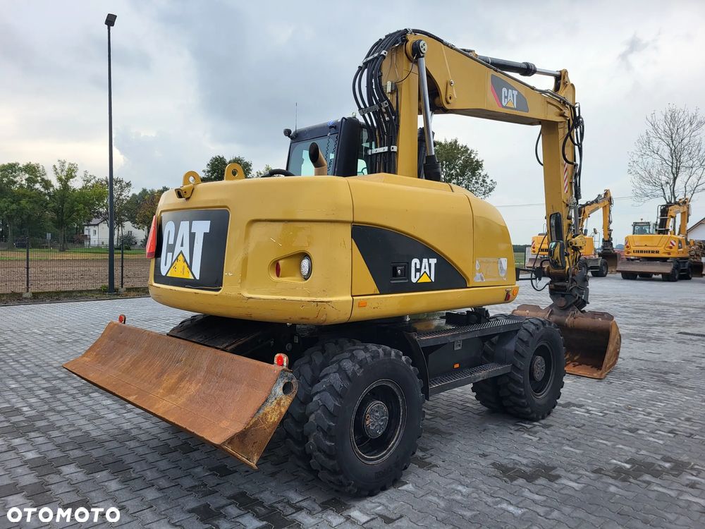 Caterpillar M 313 D / Stan idealny / - 4