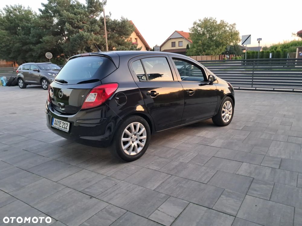 Opel Corsa 1.2 16V Enjoy - 9