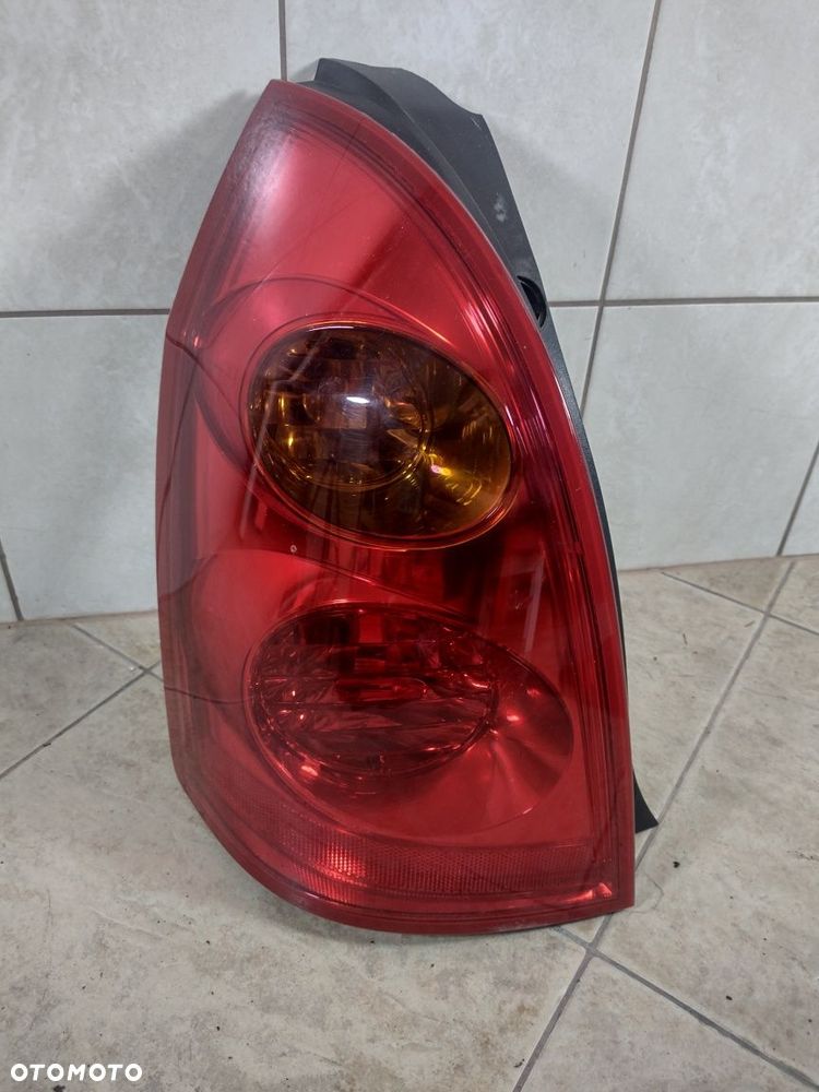 Nissan Primera P12 kombi lampa tył lewa oryginał kompletna wysyłka - 1