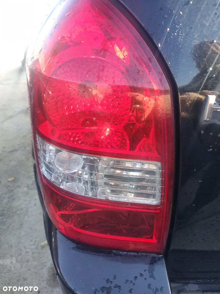 HYUNDAI TUCSON I LAMPA TYŁ LEWA - 1
