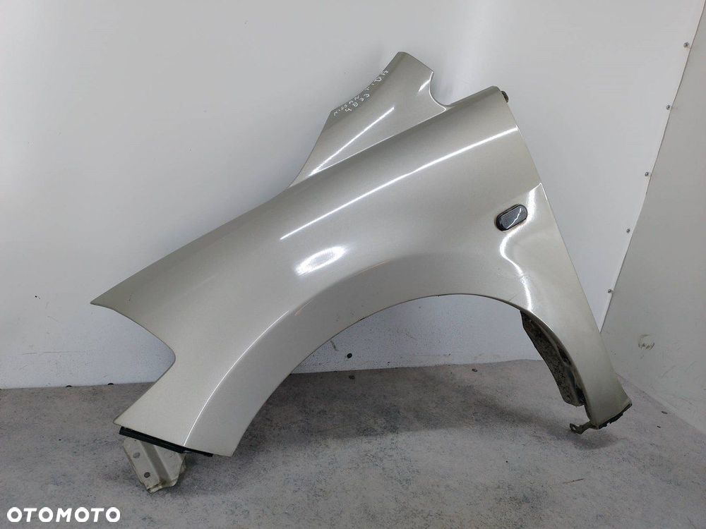 BŁOTNIK LEWY PRZÓD NISSAN TIIDA K32 - 2