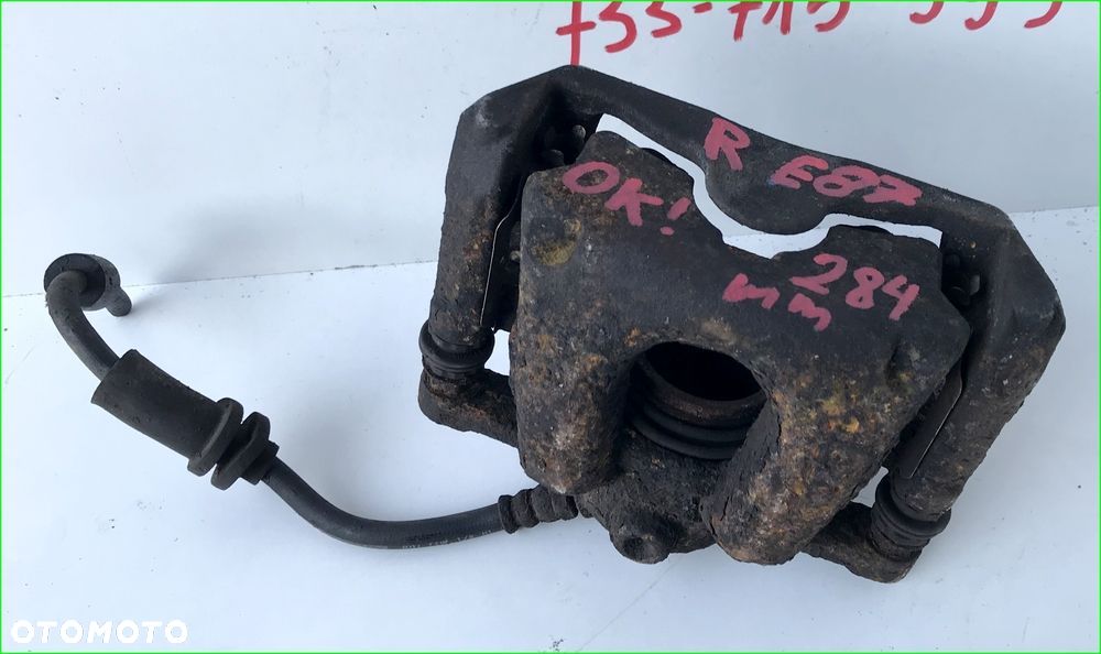 ZACISK HAMULCOWY PRAWY PRZEDNI 6774682 BMW E87 E81 - 1