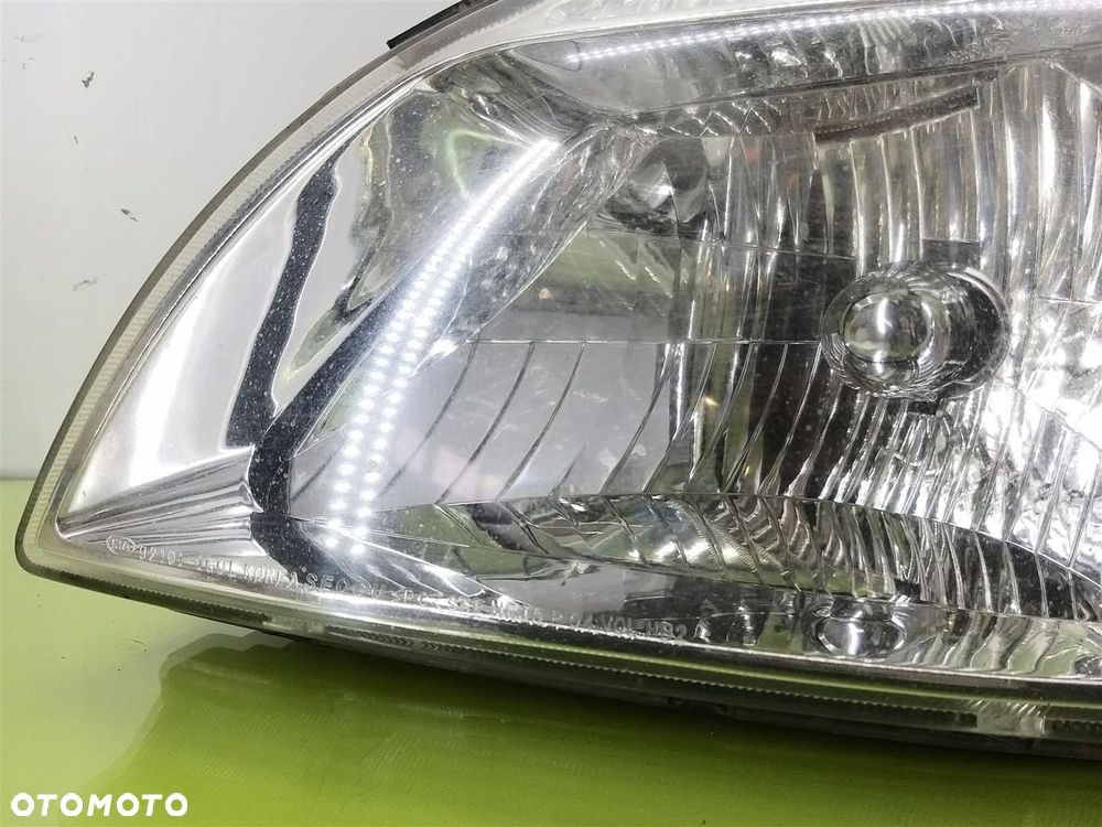 Reflektor lampa przód lewa Kia Rio II 2005-2009 PRZED LIFT 921011G0L - 2